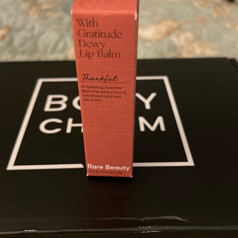 Rare Beauty by Selena Gomez Dewey lip balm in Thankful